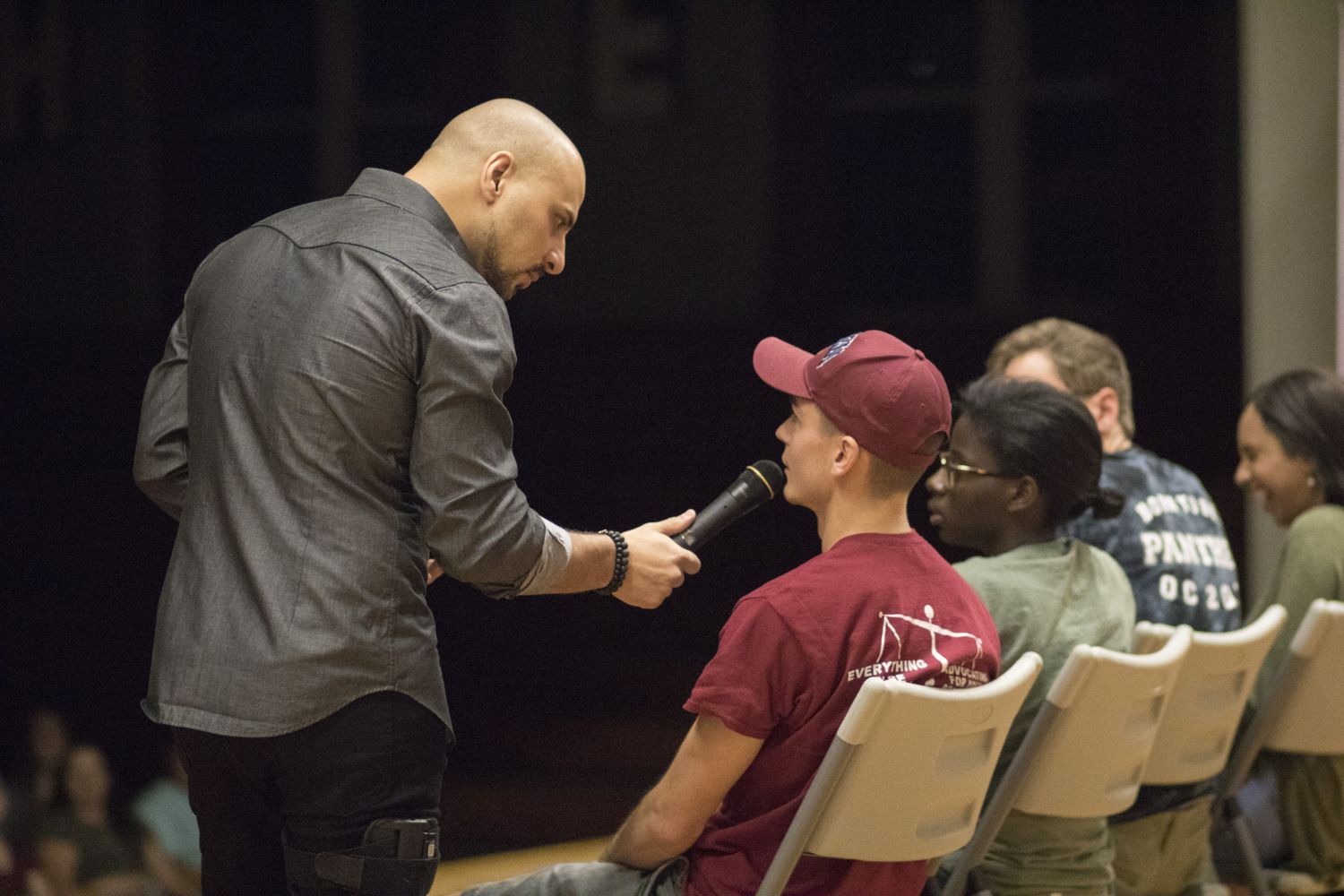 Eric Mina working with audience members up close