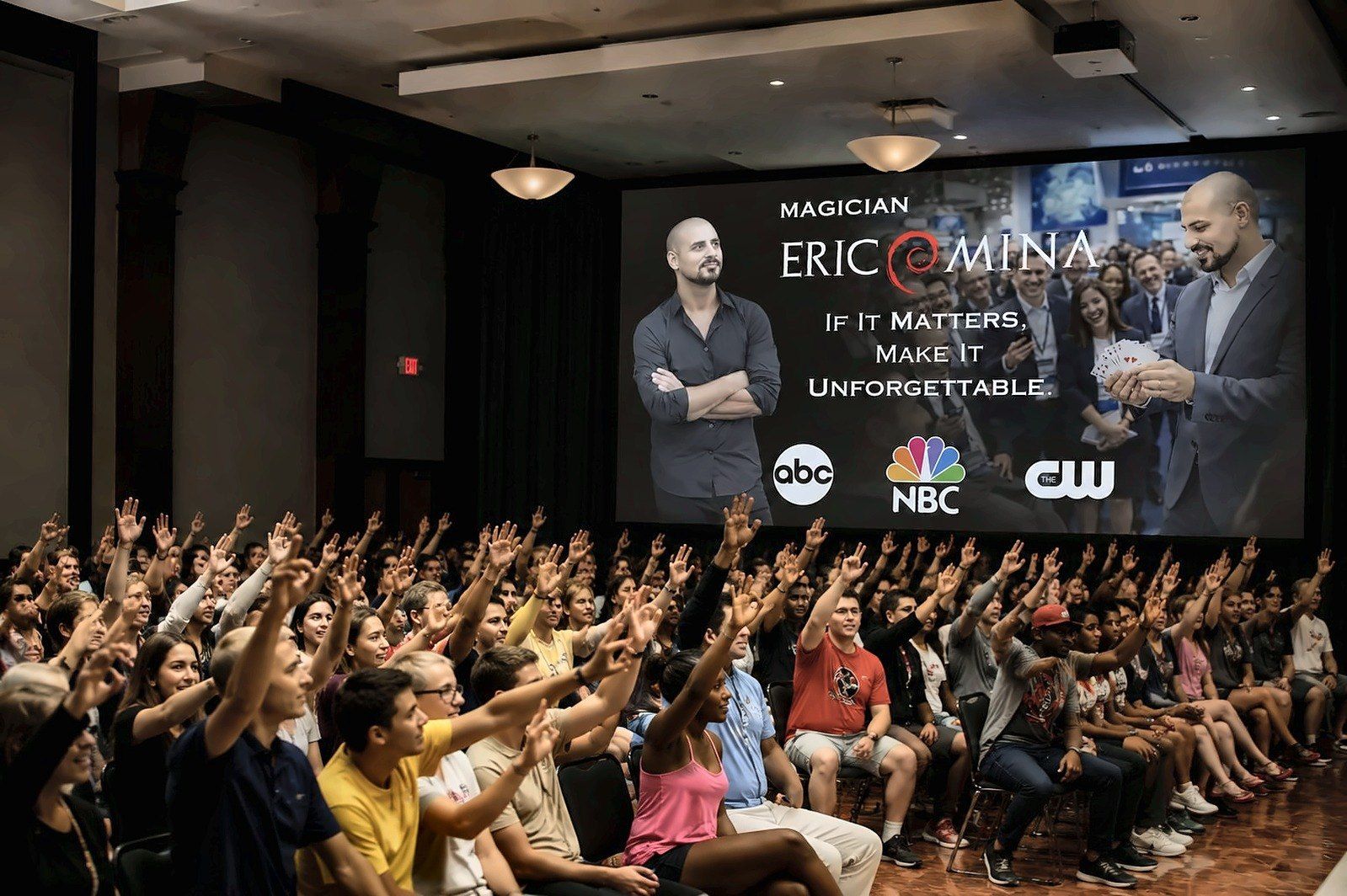 A full audience raising their hands for Eric Mina