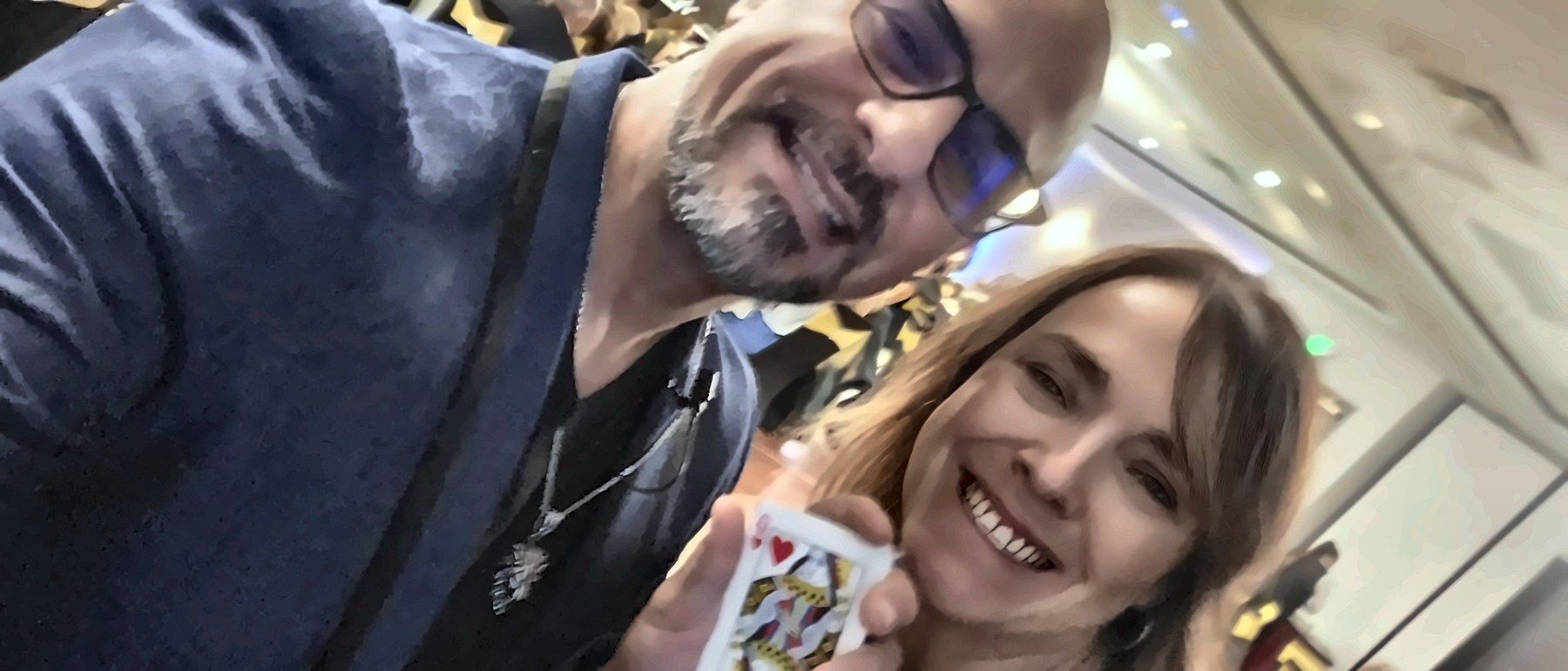 Eric Mina with the NKCC event organizer holding her card